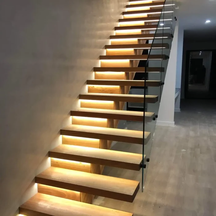 Modern custom LED stair lighting installed by Vamp Electrical Solutions in a residential home