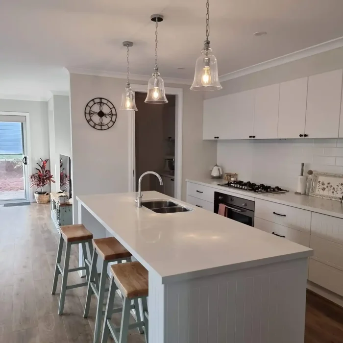 Modern kitchen pendant lighting installation completed by Vamp Electrical Solutions