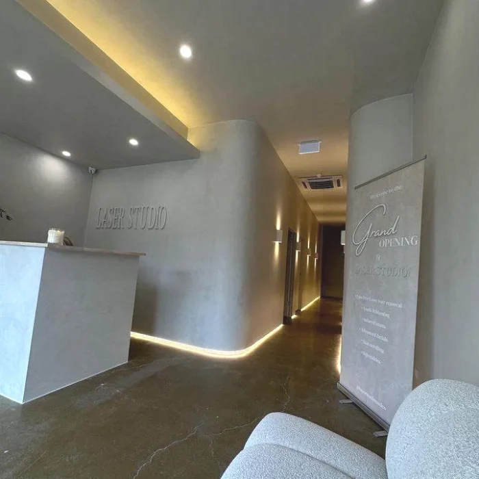 Home 27 Modern commercial reception area and corridor with ambient architectural lighting inside a Melbourne laser and skin studio