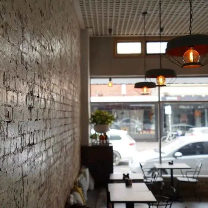 Commercial pendant lighting and accent illumination inside a Melbourne cafe